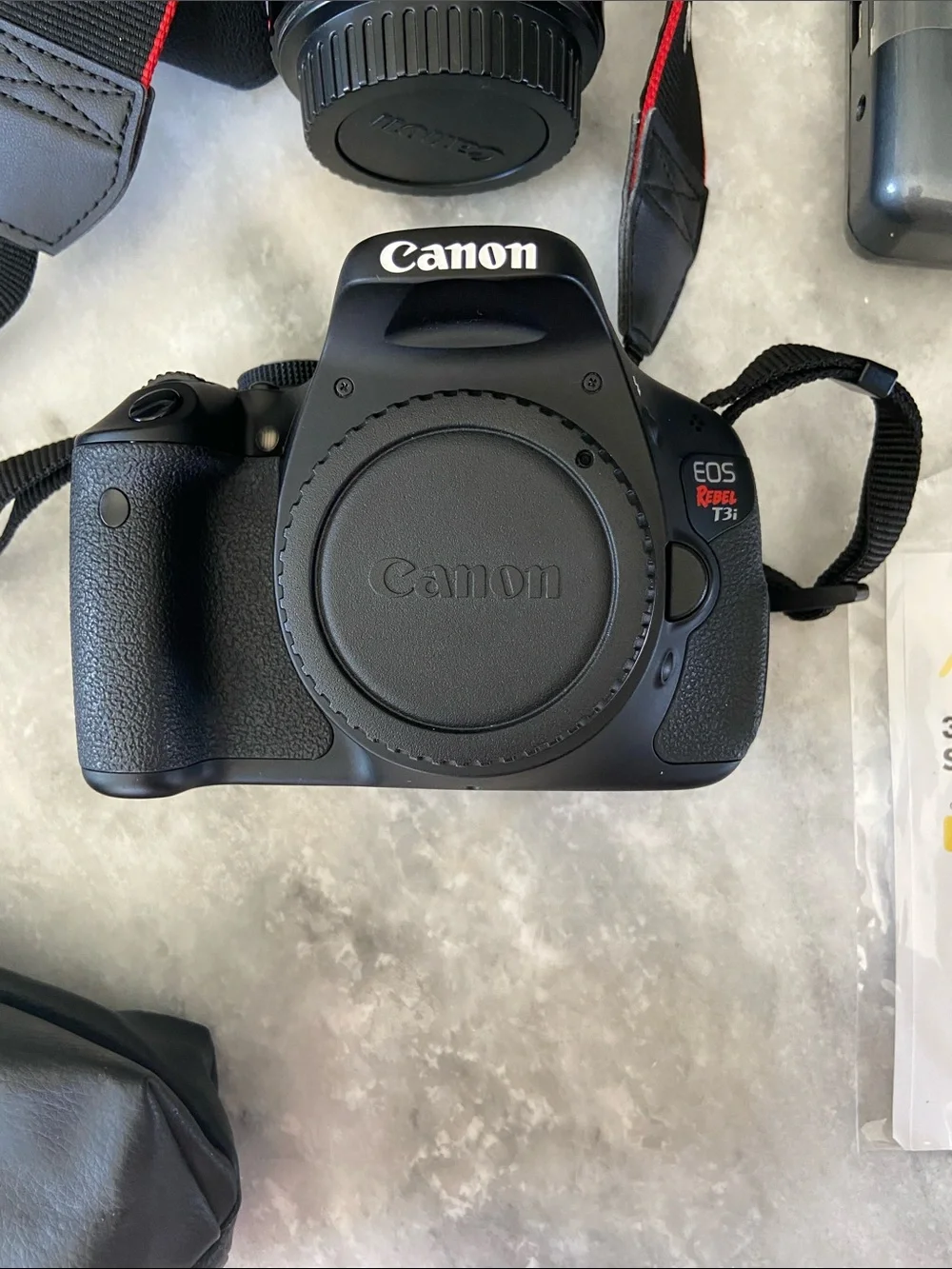 Canon DSLR Camera Body in Black with Red-Trim Strap